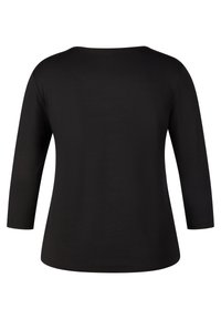 Schwarzes Langarmoberteil mit rundem Ausschnitt und lockerer Passform. Glatte Textur ohne sichtbare Muster oder Verzierungen.