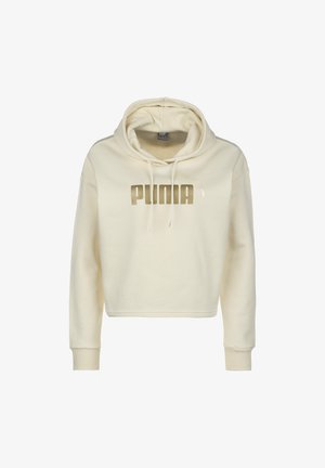 Zkrácená krémová mikina s kapucí vyrobená z měkké látky, s velkým zlatým logem "PUMA" a šňůrkami na kapuci. Rybí manžety.