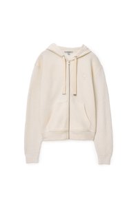 Felpa con zip color crema, dotata di cappuccio e maniche con texture a maglia. Materiale del corpo liscio con tasche frontali e dettaglio logo sottile.