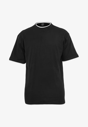 T-shirt in cotone nero con maniche corte, scollo rotondo e bordi bianchi a contrasto lungo il colletto e l'orlo delle maniche.