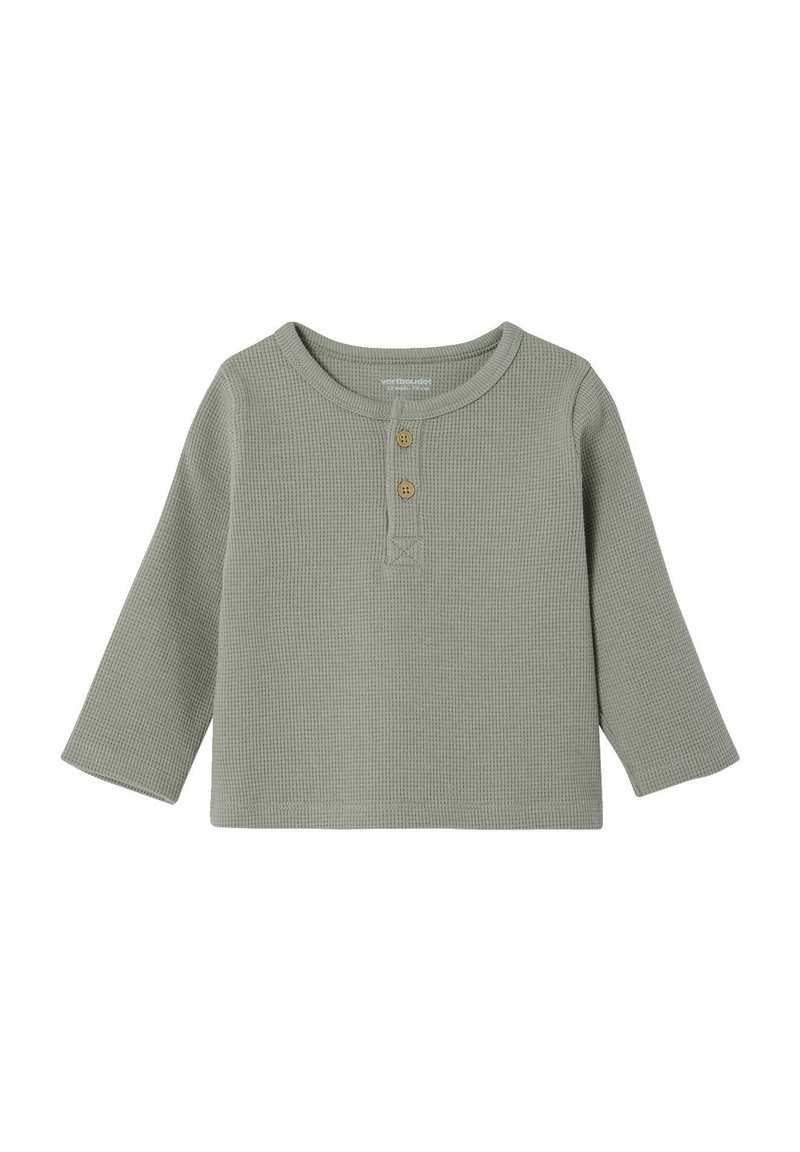 Green long-sleeve shirt in a textured waffle knit, featuring a rounded neckline, two wooden buttons at the front, and a relaxed fit.