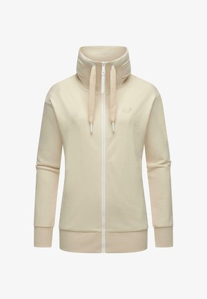 Sudadera con cremallera en color beige, con cuello alto, mangas largas y cordones texturizados. Presenta un logotipo sutil en el pecho. Tejido suave.