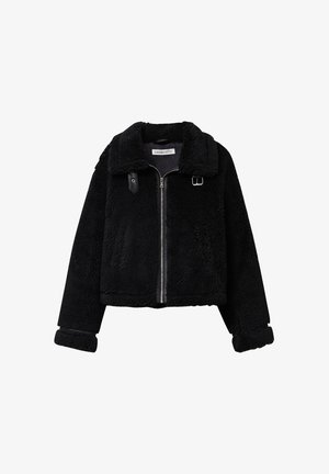 Black cropped jacket made of soft, textured fabric with a fur-like finish. Features a zipper front, wide collar, and leather buckle accents.