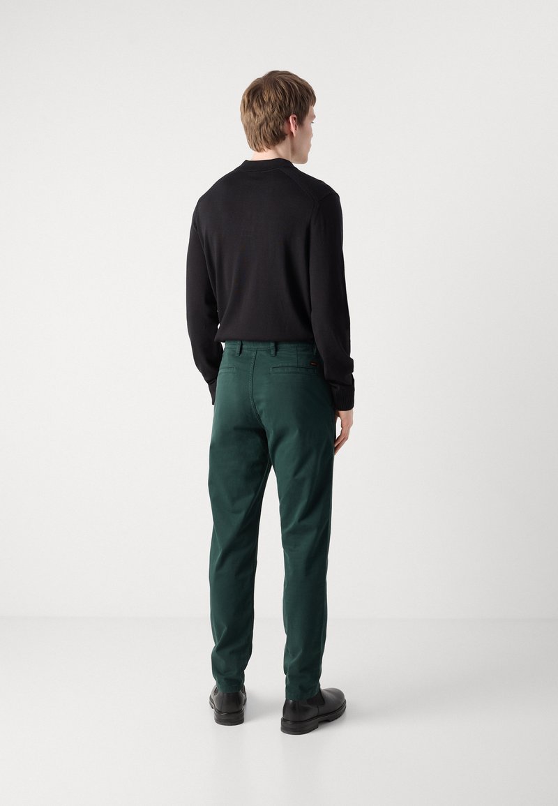Acquista BOSS Pantaloni tapered lana su