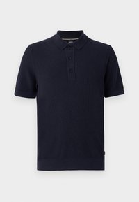 Polo de culoare bleu marin, realizat dintr-un material tricotat texturat, cu o închidere cu două butoane și mâneci și tiv cu dantelă. Design simplu și modern.