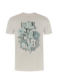Licht beige t-shirt met een bloemenprint in gedempt groen en blauw, met het woord "PURPATH" geïntegreerd in het ontwerp. Korte mouwen.