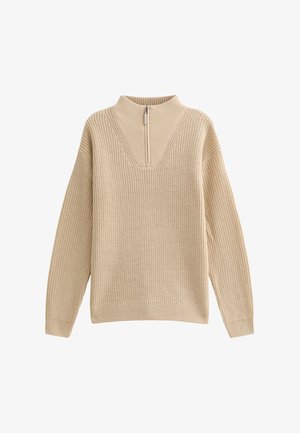 Beige knit sweater with a high collar, featuring a half zipper and textured ribbing. Loose fit with long sleeves and a straight hem.