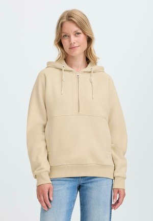 Beige hættetrøje med halvlange lynlås, frontlomme, ribbede manchetter og kant. Blød stoftekstur, afslappet pasform, casual design.