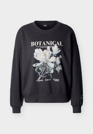 Must muster, millevalge ja kuldse magnoolia lillekujundusega, ees tekstid "BOTANICAL," "Magnolia" ja "BOTANICAL GARDEN," ümar kaelus ja pikad varrukad.