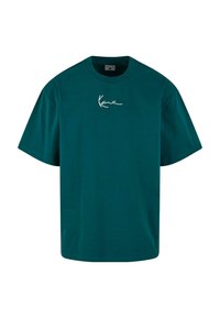 Tricou din bumbac teal, cu mâneci scurte, guler rotund și logo alb scris cursiv pe partea stângă a pieptului. Margine dreaptă și croială lejeră.