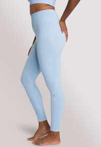 OCEANSAPART TARA - Leggings - glacialblue