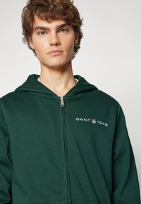 GANT Cipzáras pulóver - tartan green