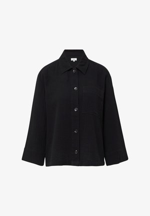 Schwarzes Hemd mit Knopfleiste aus strukturiertem Stoff, mit Kentkragen, Brusttasche und Ärmeln in Dreiviertellänge.