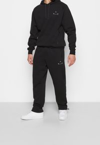 Jordan Träningsbyxor - black