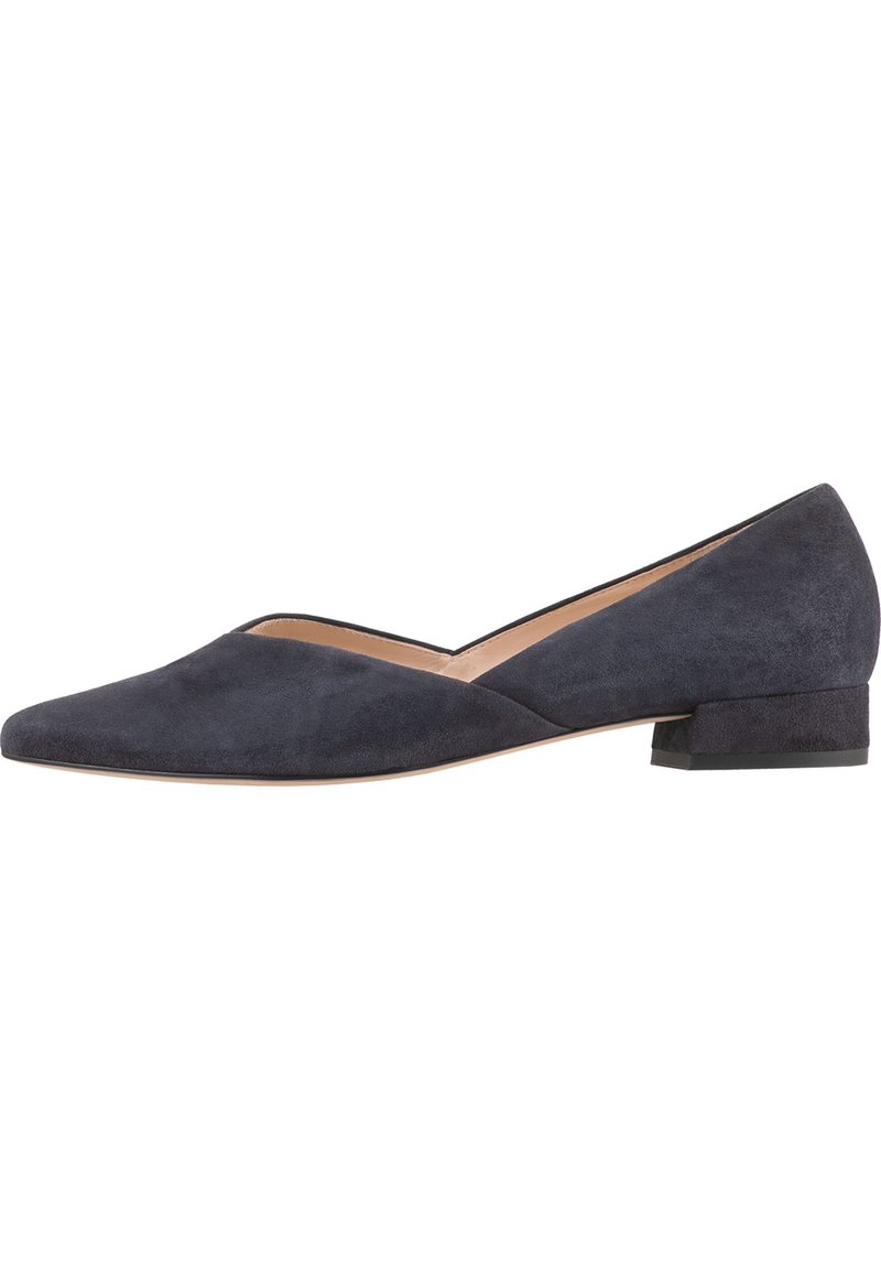 Dark navy suede shoe with a pointed toe and low block heel. Features a v-shaped cutout along the sides for a modern design.