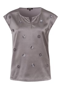 Grå satinbluse med små blomsterapplikationer og en delt halsudskæring, ærmeløs med en løs pasform.