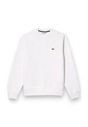 Bela majica s kapuco z okroglim izrezom in rebrastimi manšetami. Ima majhen zeleni logo Lacoste na prsih. Mehka bombažna tkanina.