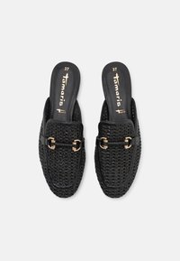 Black woven slip-on shoes with a textured upper, flat sole, and gold accent hardware on the vamp. Size 37 printed on the insole.