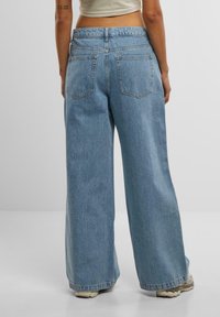 DEF TRIP BAGGYS - Relaxed fit jeans - light blue