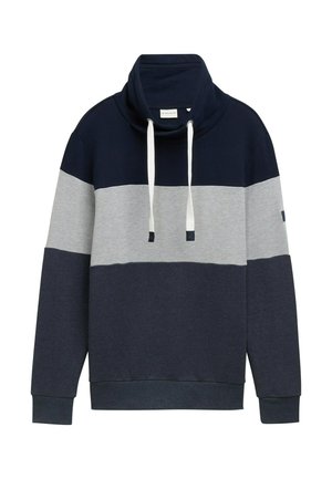 Sudadera color bloqueada en azul marino y gris con cuello alto, cordones y puños acanalados. Tela de algodón suave con un corte relajado.