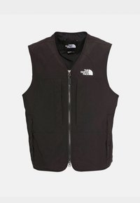 Czarna bezrękawnik z gładkiego, lekkiego materiału. Posiada zamek błyskawiczny z przodu, dwie boczne kieszenie oraz logo w górnym lewym rogu.