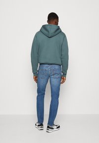 Levi's® Jeans Tapered Fit - blue denim