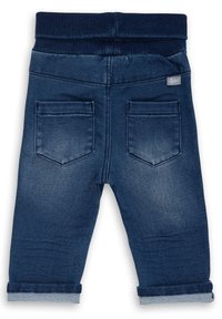 Pantaloni in denim per toddler con una vita a coste blu navy, due tasche posteriori e orli arrotolati con denim a contrasto. Colore blu scuro con sfumature.