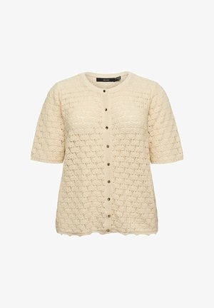 Krém bézs rövid ujjú kötött kardigán kerek nyakkivágással, hullámos szegéllyel és elöl kis sötét gombokkal záródó előrrésszel.