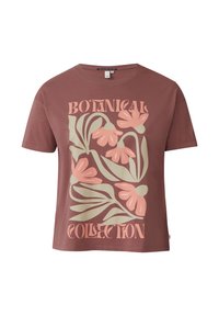 T-shirt à manches courtes de couleur rose avec un imprimé botanique de fleurs et de feuilles dans des nuances pastel. Le texte indique "COLLECTION BOTANIQUE."