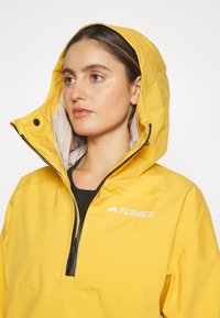 Adidas Terrex XPERIOR TWO-LAYER LINED RAIN.RDY - Vodotesná bunda - preloved yellow