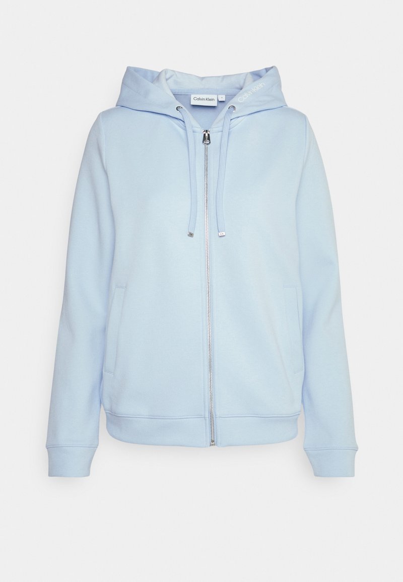 Jasnoniebieska bluza z kapturem wykonana z miękkiego materiału, z przednim zamkiem, regulowanym kapturem i bocznymi kieszeniami. Prosty, minimalistyczny design.