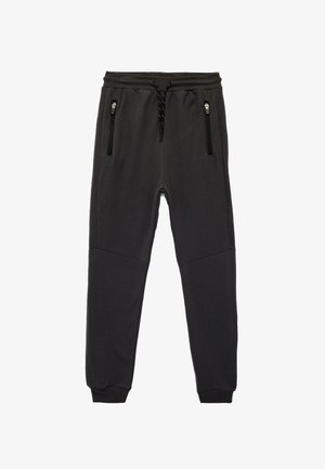 Schwarze Sweatpants mit strukturierter Oberfläche, ausgestattet mit einem Kordelzugbund und seitlichen Reißverschlusstaschen. Kontrastbesatz in der Nähe der Knie.