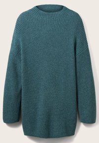 Pull en maille bleu sarcelle avec col rond, présentant un motif texturé diagonal et des épaules tombantes. Texture douce et coupe décontractée.