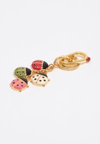 Ladybug charm keychain with four multicolored ladybugs in red, green, pink, and white, featuring black accents and a golden clasp.