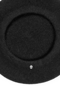 Black wool beret with a small silver skull emblem centered near the brim on a white background.