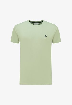 Šviesiai žalia trumpa rankovė marškinėliai iš medvilnės. Yra apvalus iškirpimas ir mažas juodas kaktusas logo kairiajame krūtinės plote.