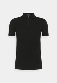 Polo shirt noir en tissu lisse, avec un col zippé et des manches courtes à bords côtelés. Logo discret sur la poitrine.