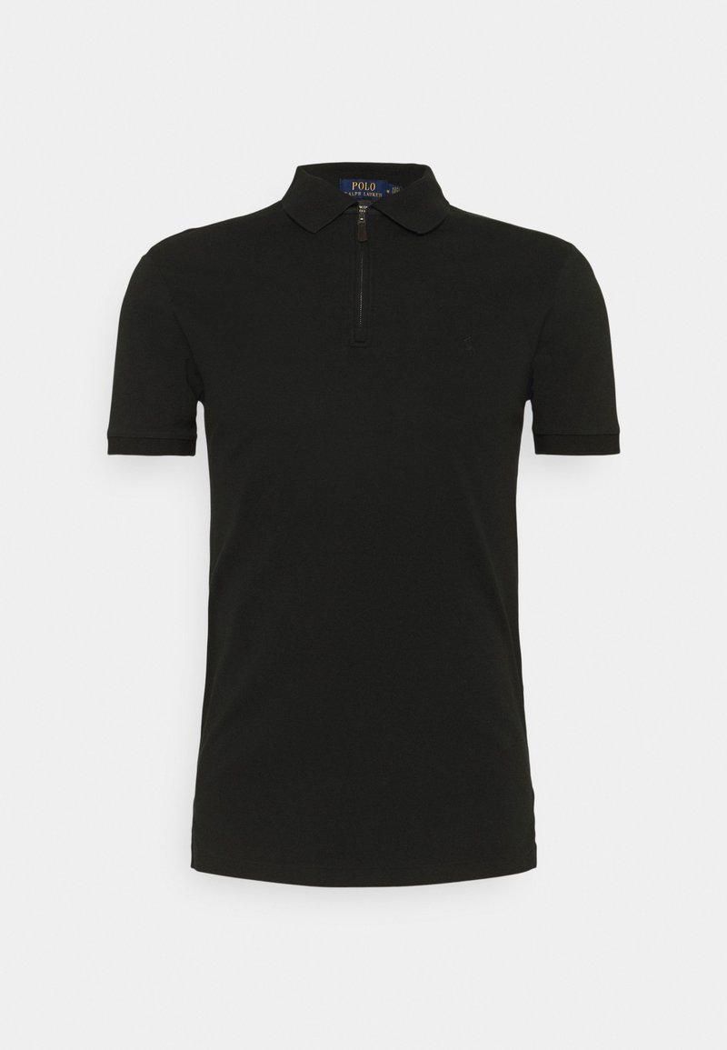 Polo shirt noir en tissu lisse, avec un col zippé et des manches courtes à bords côtelés. Logo discret sur la poitrine.