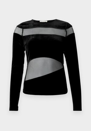 Camisa preta de mangas longas com uma combinação de painéis de veludo e rede, featuring recortes geométricos e um decote redondo.