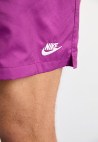 Nike Sportswear Pantalon de survêtement - purple