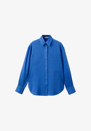 Blue long-sleeve button-up shirt with two front pockets and a pointed collar, made of textured fabric.