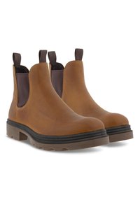 Bottes de cheville en cuir marron, avec des panneaux latéraux élastiques, des languettes de tirage et des semelles en caoutchouc robustes avec une finition texturée.
