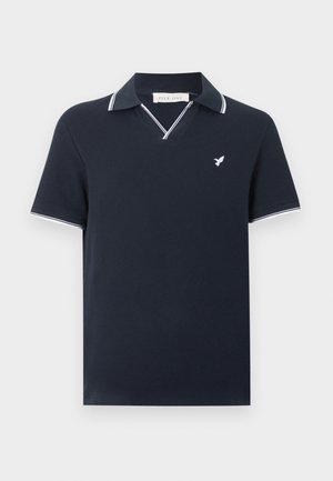 Polo blu marina con maniche corte e rifiniture bianche su colletto e maniche, con un piccolo logo bianco di un uccello sul petto.