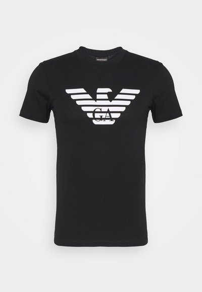 Black cotton t-shirt featuring a white striped eagle logo with "GA" centered below. Crew neckline and short sleeves.