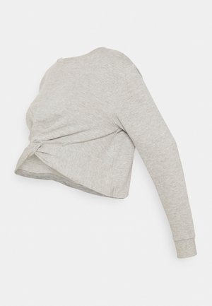 Sweatshirt court à manches longues gris en tissu doux et texturé avec un détail twist sur le côté et des poignets côtelés.