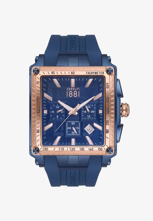 Cerruti 1881 kronografur med et rektangulært blåt siliconeskærf, roseguld detaljer, tekstureret blå skive og flere under-skiver.