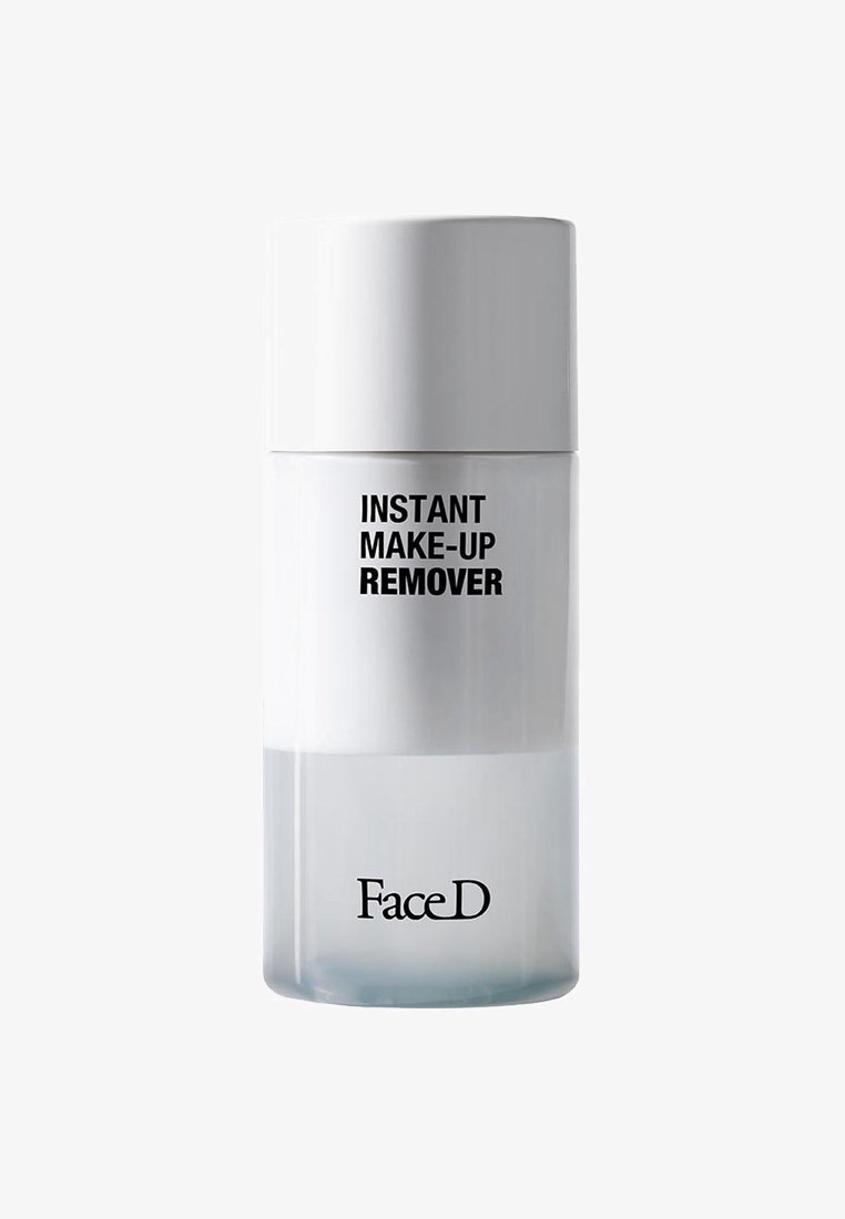 Bottiglia trasparente con un tappo bianco, che mostra "STRUCCANTE ISTANTANEO" in caratteri neri in grassetto e il logo "FaceD" in basso.