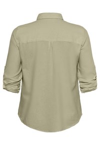 Lichtgroen, langekorte shirt met kraag. Voorzien van opgerolde mouwen en een rugplooi voor extra comfort. Gladde textuur en rechte zoom.