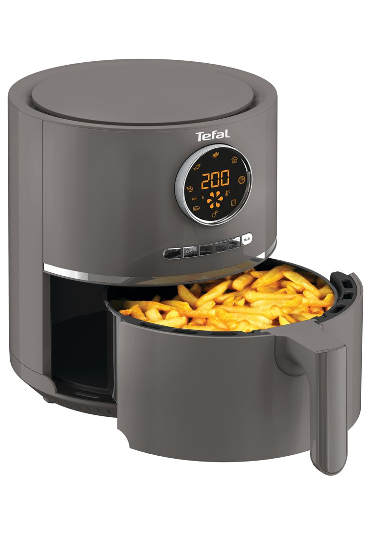 Friteuse à air Tefal en gris foncé avec un design rond, un écran digital et un panier coulissant rempli de frites dorées. Texture lisse, finition moderne.