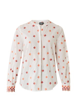 Witte stoffen shirt met een geometrisch oranje en paars patroon, lange mouwen en decoratieve, gepatroneerde manchetten. Knopen sluiting aan de voorkant.